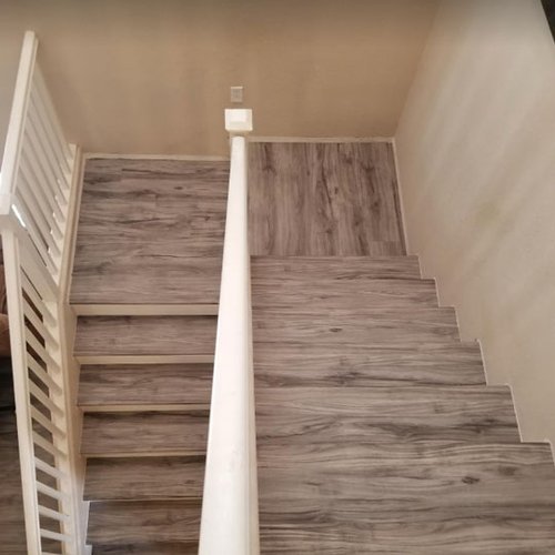 hardwood stairs provided and installed by Budget Flooring & Shutters in Las Vegas, NV